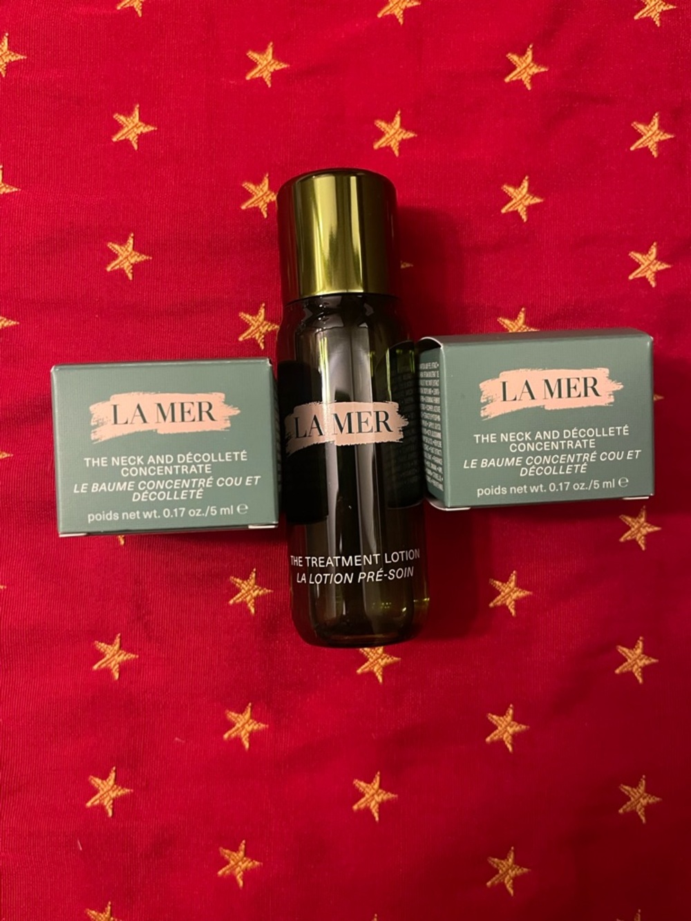 La Mer green and gold skincare trio
